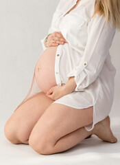 Kobieta w ciąży - obrazy, fototapety, plakaty