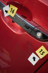 Naklejka premium Crime scene investigation - finding and developing of fingerprints in car