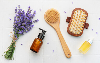 Lavender spa. Lavender salt, natural essential oil, massage brushes and fresh lavender