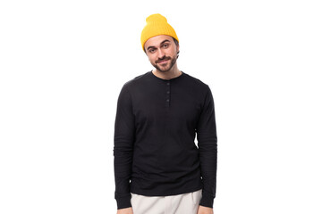 young masculine brunette caucasian male model with beard dressed casually on white background with copy space