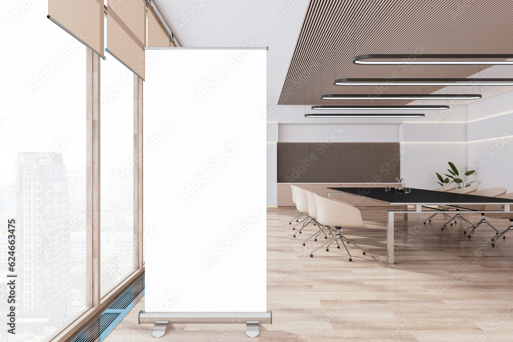 Poster front view of blank white rollup banner and modern light meeting room interior with office desk and 