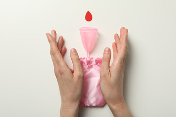 Menstrual cup with a bag on a white background