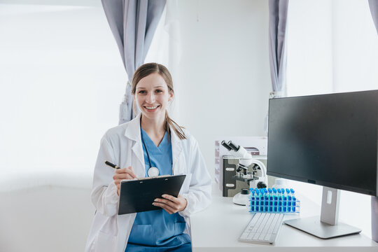 female scientist in the laboratory medical pharmacy or blood DNA engineering Dropper or scientific device to test health analysis or future vaccine innovation.