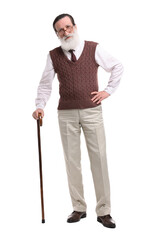Senior man with walking cane on white background