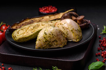 Delicious grilled vegetables zucchini, eggplant, peppers and mushrooms with salt, spices and herbs