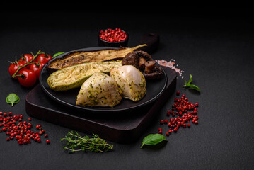 Delicious grilled vegetables zucchini, eggplant, peppers and mushrooms with salt, spices and herbs