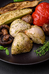 Delicious juicy grilled chicken with salt, spices and herbs with vegetables