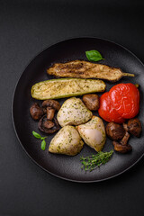 Delicious juicy grilled chicken with salt, spices and herbs with vegetables