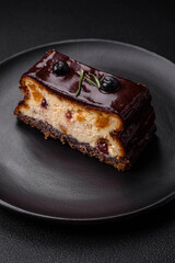 Delicious sweet dessert cheesecake with candied fruits in chocolate