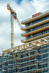 building facade under construction, real estate development © soleg
