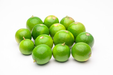 fresh lemons on plate on a white background