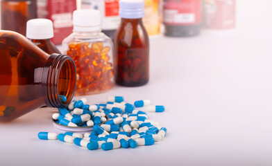 group of medicine capsule  and bottles on white background.