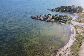 Aerial, drone view of Hanko town coast, Hango, Finland, with beach and coastal waterfront line. Hanko, Finland