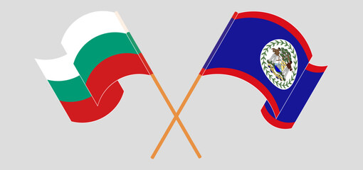 Crossed and waving flags of Bulgaria and Belize