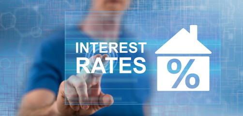 Man touching an interest rates concept