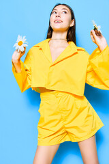 woman smile happiness health chamomile young yellow blue portrait flower model
