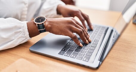 African american woman business worker using laptop at office