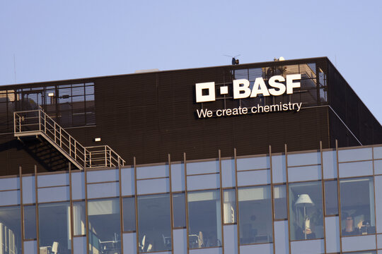 Warsaw, Poland - July 12, 2023: Close up of BASF sign on its office building in Warsaw, Poland. BASF SE is a German multinational chemical company.