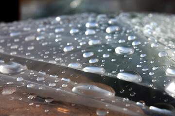 some rain drops laying on plastic foils