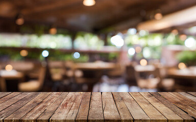 Wooden board empty table background. abstract blurred cafe background