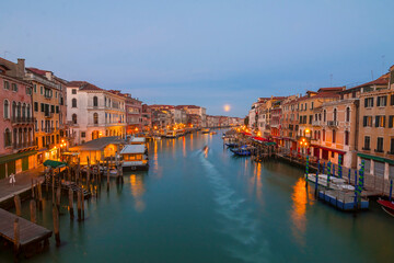 Panoramic view on famous Grand Canal among historic houses in Venice, Italy at sunny day