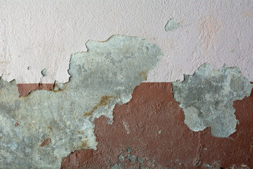 The old pink cement wall is worn. The paint color is cracked and causes plaster peel until the...