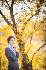 Autumnal Beauty: Brunette Girl in the Enchanting Forest