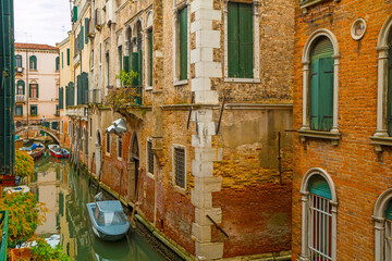 Fototapeta na wymiar Brick facade of a house in Venice, Italy. 