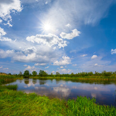 small calm river at summer sunny day, beautiful summer countryside landscape