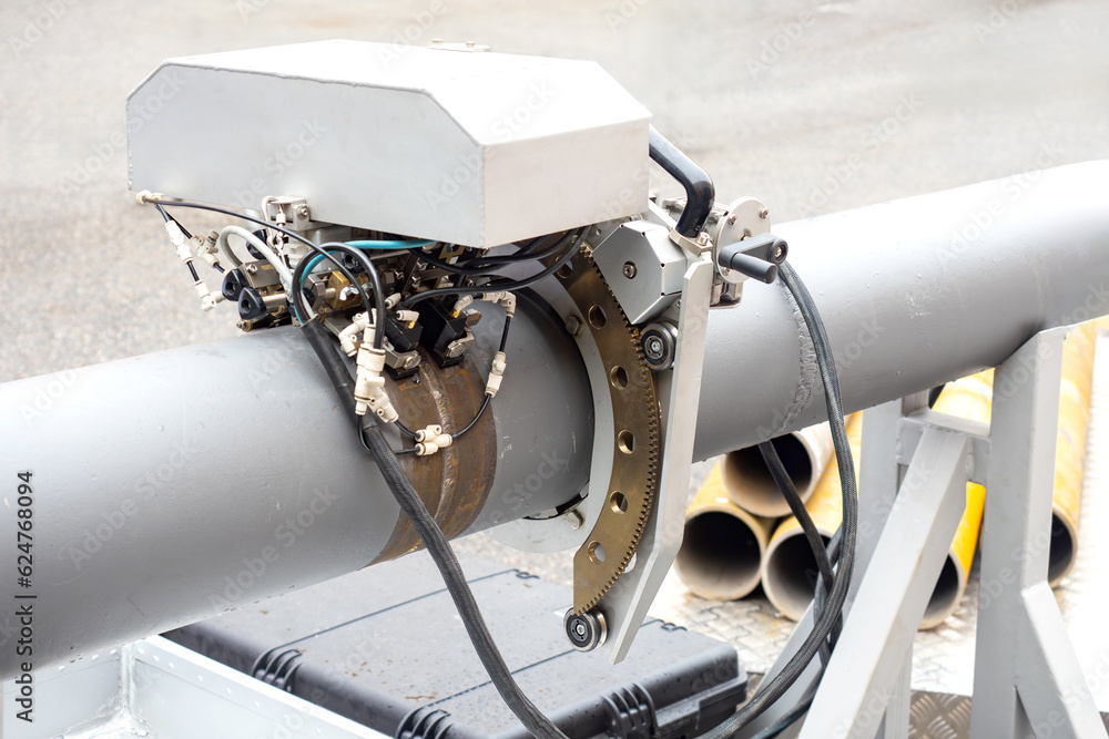 Poster pipes welding. automation of welding works. robotic soldering machine for pipeline. process of solde