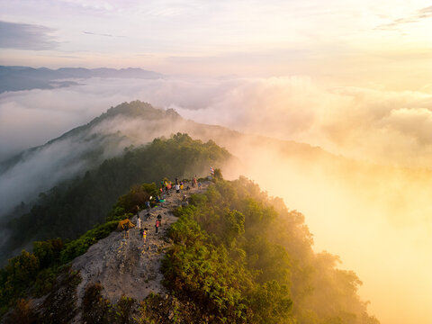 Beautiful mist with the mountains during sunrise time at Gunung Silipat peaks located in Yala province south Thailand