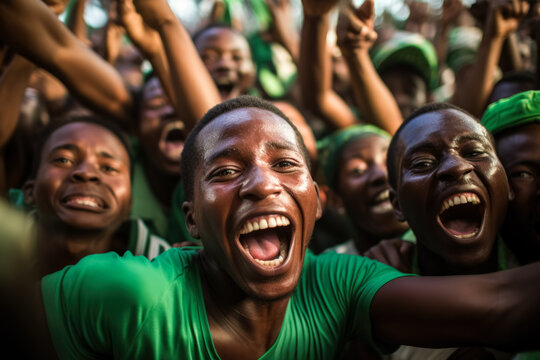 Nigerian football fans celebrating a victory  