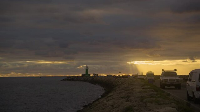 Golden Hour Sun Rays at South mole Lighthouse, Fremantle, Perth Western Australia
