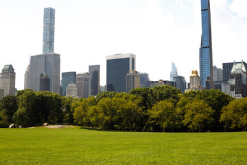 New York City. A sunny day in Central Park. View of 59th street  from Central Park. 2023