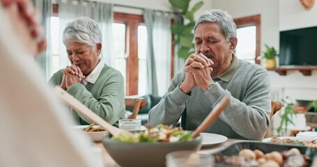 Senior man, woman and praying for food at dinner table with big family at home. Group of people in worship, prayer or thanks for eating lunch meal, respect or gratitude in dining room at thanksgiving