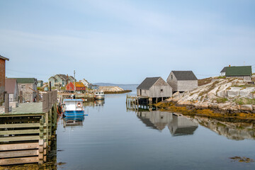Fototapeta premium Boats in the harbor of a fishing village at low tide on the Atlantic coast of Canada.