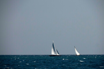 strong wind regatta in barcelona Sailing ship in a strong wind. Yachting