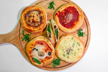 Lebanese Middle Eastern Manakish, Freshly baked Flatbread of cheese, thyme, chicken  and meat - Arabian food and Pastry - Levantine cuisine