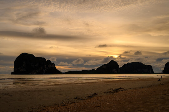 Nature, Landscape, Twilight time on the beach and reflection a mountain with sand. © woanwoan
