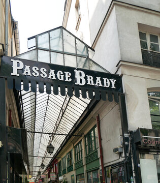 Entrance of passage Brady. Covered arcades : the "passages couverts" in Paris.  Shops, restaurants and tourist attractions. Prefiguration of contemporary shopping malls. 
