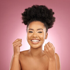 Black woman, portrait and floss teeth in studio for smile, dental hygiene and care of gum...