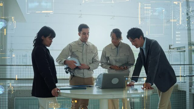 Multinational engineers meeting in the lobby and digital technology concept.