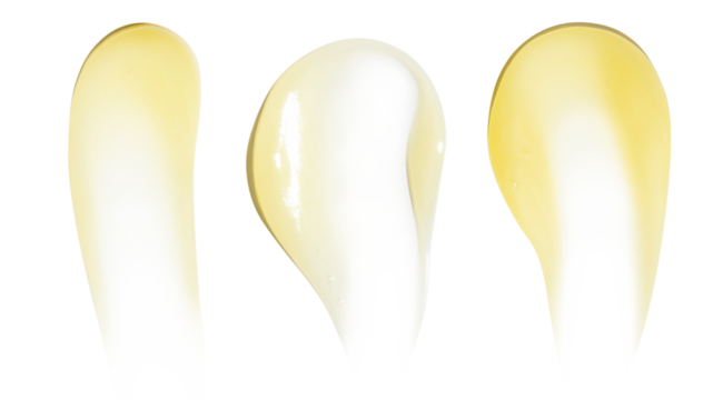 Smears of yellow cream, balm, conditioner with banana, egg or chamomile on an empty background. Isolated.