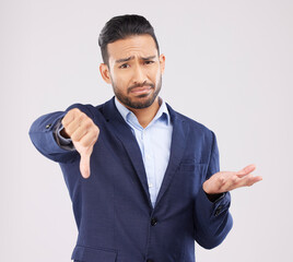 Studio portrait, thumbs down and business man with negative fail sign, no opinion vote or decision...