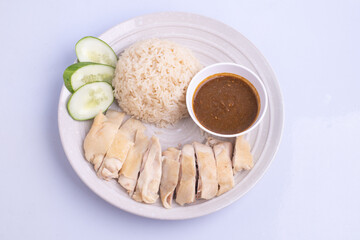 Hainanese chicken rice with soup .steamed chicken rice - Asian food style on white background
