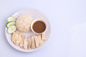 Hainanese chicken rice with soup .steamed chicken rice - Asian food style on white background