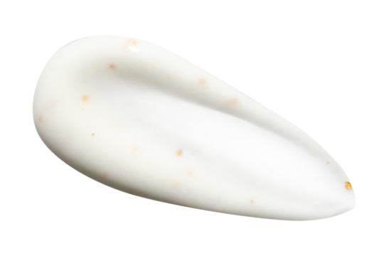 Smear of cream with 24 carat gold on an empty background. isolated