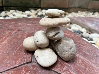 zen stones on wooden background