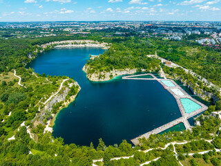 Swimming and paddling pools on Zakrzówek lake. Krakow, Poland - 624823677