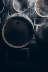 Obraz na płótnie Canvas Barrels of wine in the cellar